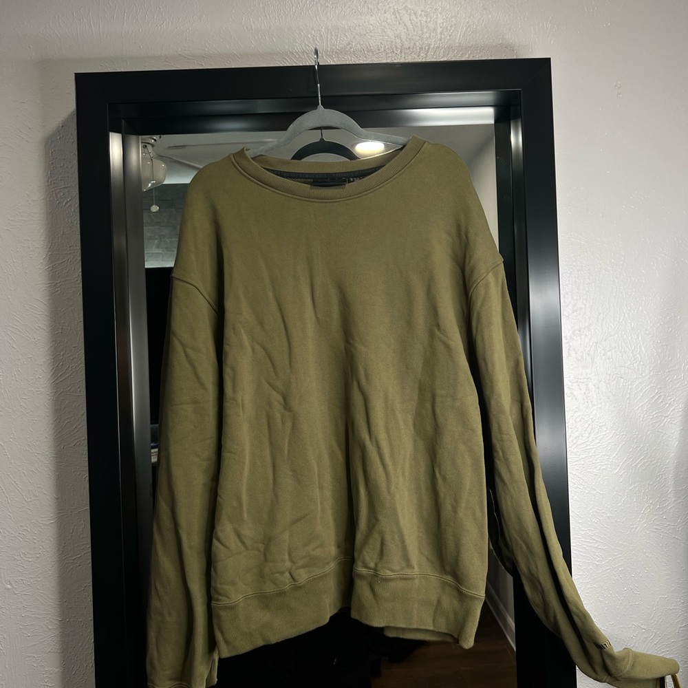 Pharrell’s Williams Green Sweatshirt
